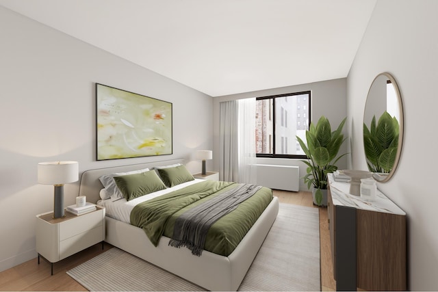 5 E 22nd St Unit 9R, New York City, NY 10010 - bedroom featuring light wood-style flooring and baseboards