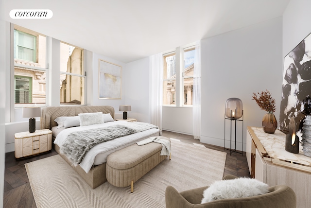 bedroom with baseboards and visible vents