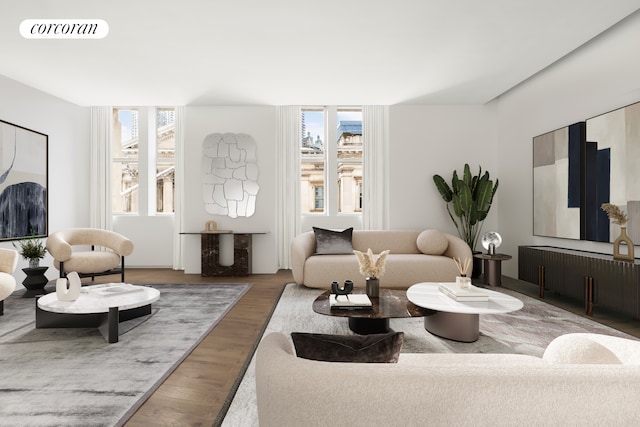 living area featuring wood finished floors and visible vents