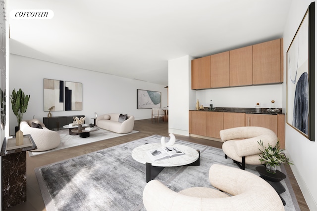 living room with wood finished floors, visible vents, and indoor bar