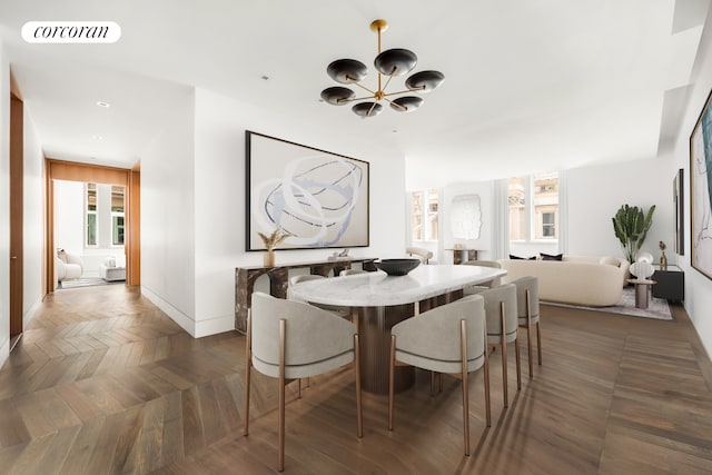dining area featuring visible vents, baseboards, plenty of natural light, a notable chandelier, and recessed lighting