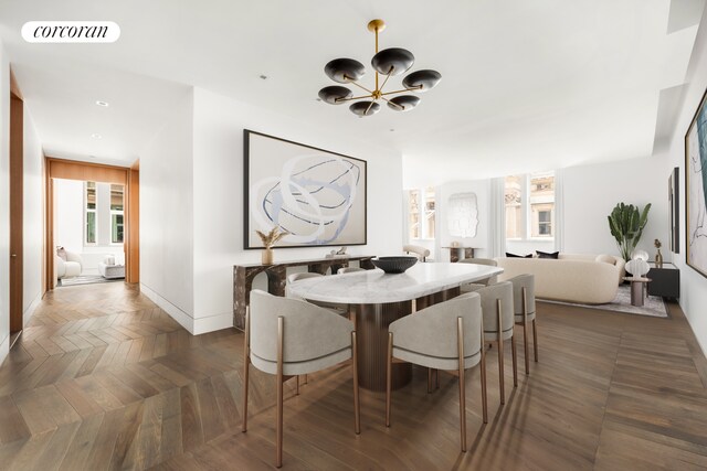 49 Chambers St Unit 5D, New York City, NY 10007 - dining room featuring a chandelier, baseboards, recessed lighting, and plenty of natural light