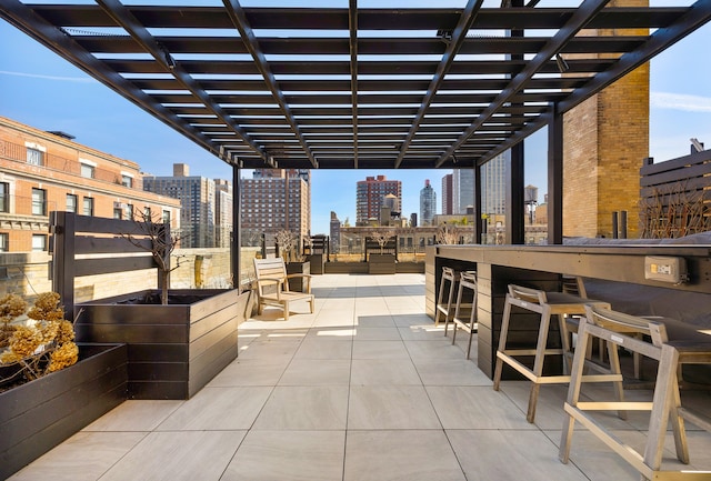 130 E 94th St Unit 5-E, New York City, NY 10128 - view of patio / terrace featuring a skyline view and a pergola