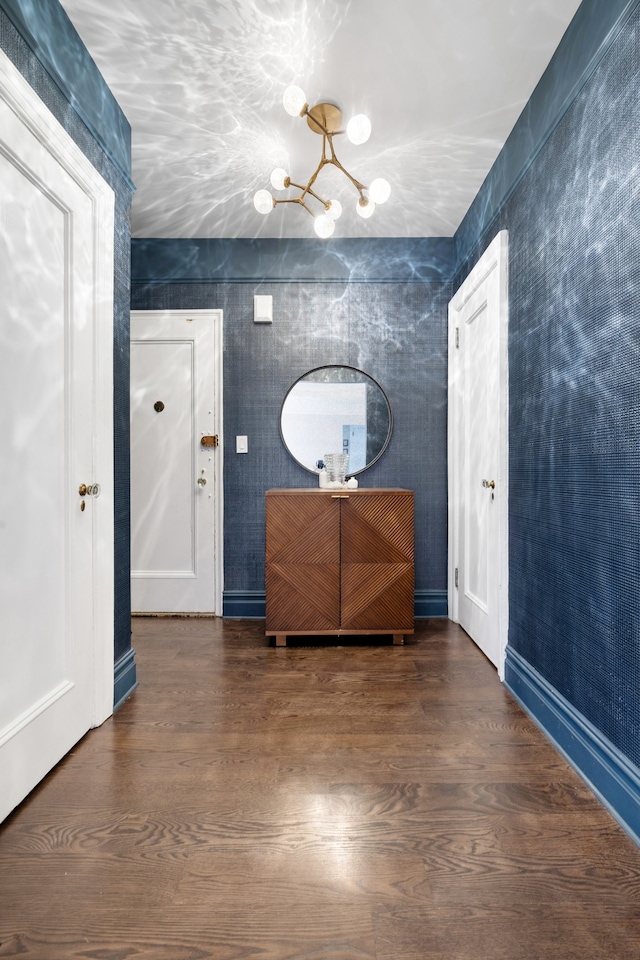 130 E 94th St Unit 5-E, New York City, NY 10128 - entrance foyer featuring a chandelier and wood finished floors