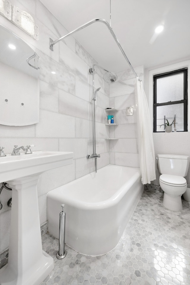 130 E 94th St Unit 5-E, New York City, NY 10128 - full bath with shower / bathtub combination with curtain and toilet