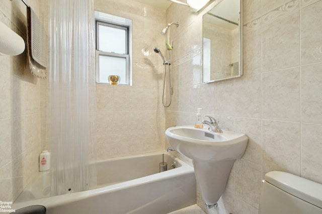 3850 Hudson Manor Ter Unit 1Ee/2Ee, New York City, NY 10463 - bathroom featuring tile walls, shower / tub combo, toilet, and decorative backsplash