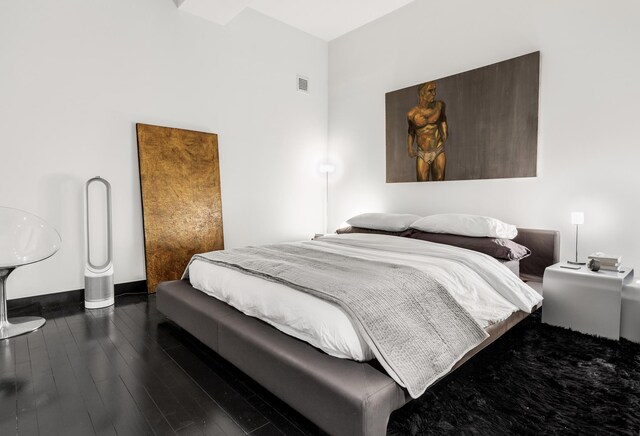 20 Pine St Unit 516, New York City, NY 10005 - bedroom with dark wood finished floors and baseboards