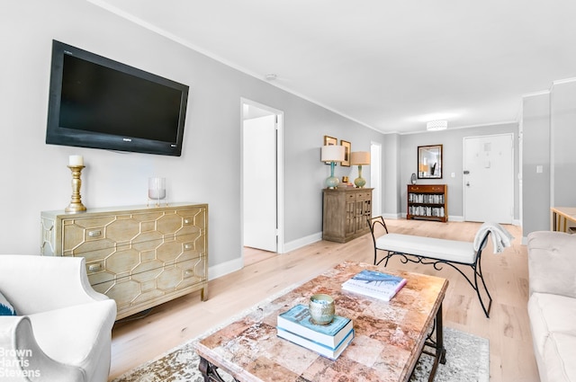 520 E 72nd St Unit 9C, New York City, NY 10021 - living room featuring light wood-type flooring, crown molding, and baseboards