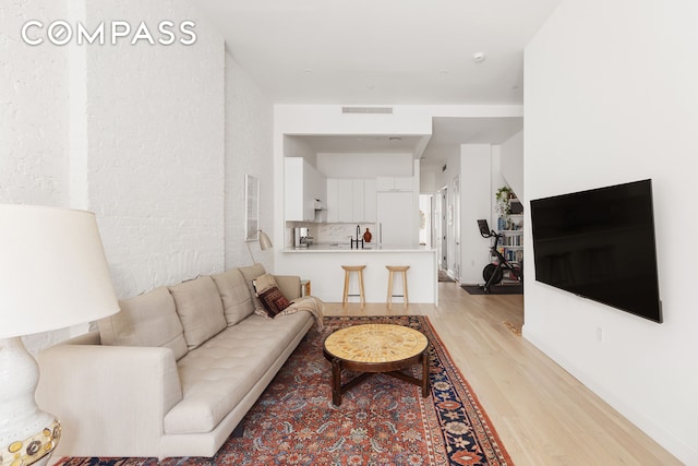 living area with light wood-type flooring