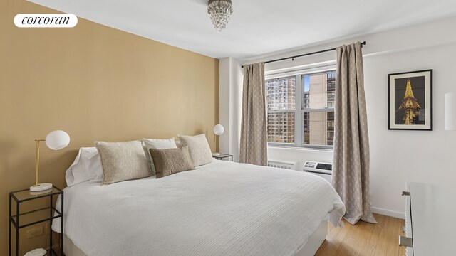 100 W 93rd St Unit 8K, New York City, NY 10025 - bedroom featuring light wood-style floors and baseboards