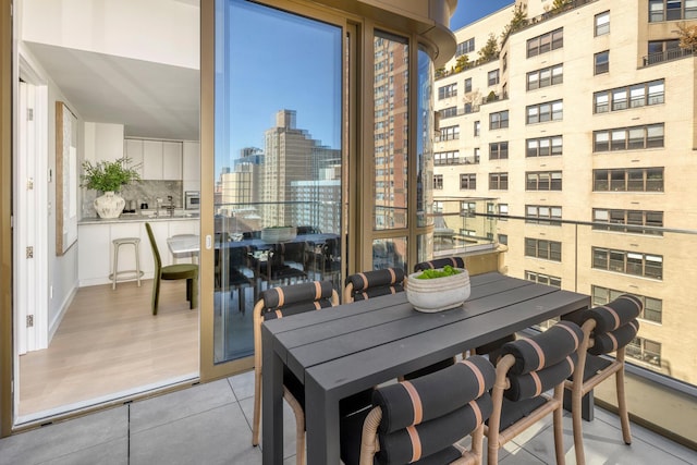 250 E 25th St Ph-C, Ph-C New York City, NY 10010 - balcony with outdoor dining area and a city view