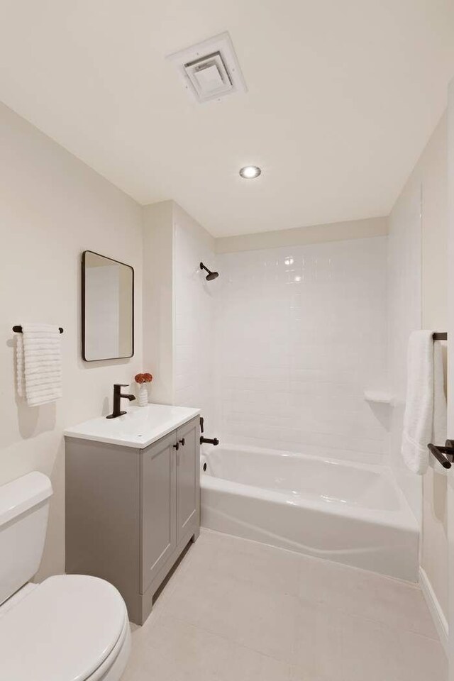 603 W 148th St Unit 3A, New York City, NY 10031 - bathroom featuring toilet, vanity, shower / tub combination, tile patterned flooring, and recessed lighting