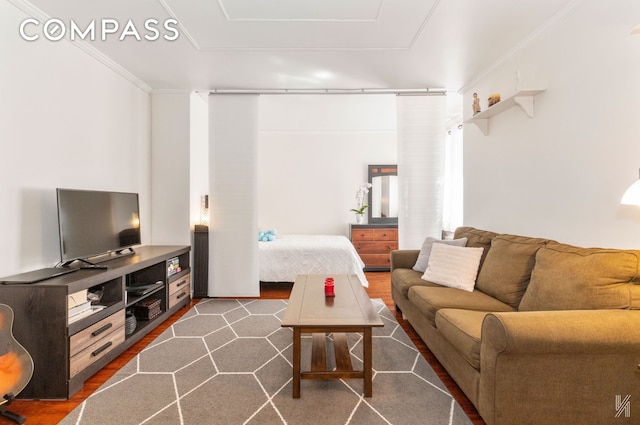 39-30 52nd St Unit 5E, New York City, NY 11377 - living area with dark wood-style flooring and crown molding