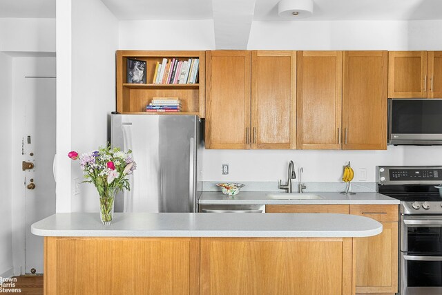 2166 Broadway Unit 16F, New York City, NY 10024 - kitchen featuring appliances with stainless steel finishes, open shelves, and light countertops