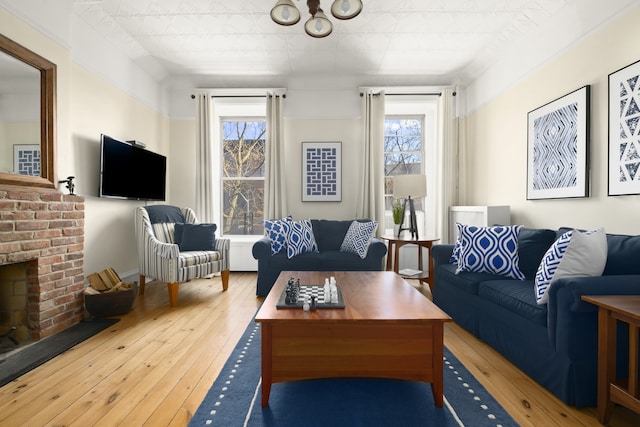 230 Union St, New York City, NY 11231 - living room with hardwood / wood-style floors, plenty of natural light, and a fireplace