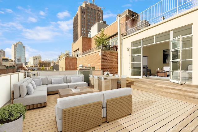 55 Walker St Ph, Ph, New York City, NY 10013 - wooden deck with an outdoor living space and a city view