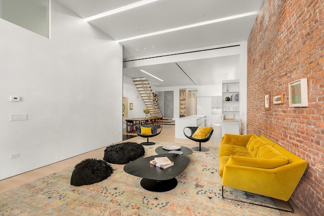 55 Walker St Ph, Ph, New York City, NY 10013 - living area with brick wall and wood finished floors