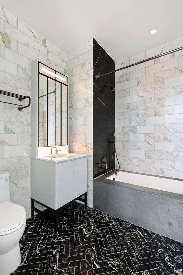 959 1st Ave Unit 25E, New York City, NY 10022 - bathroom featuring a combined bath / shower with marble appearance, tile walls, and vanity