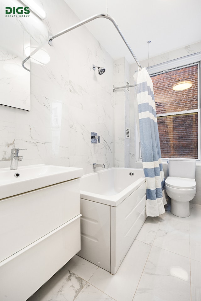 full bathroom featuring marble finish floors, toilet, shower / tub combo with curtain, and vanity