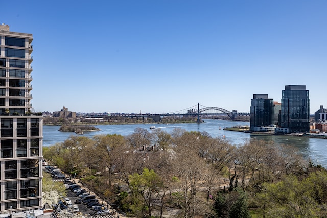 water view featuring a notable bridge and nearby urban area