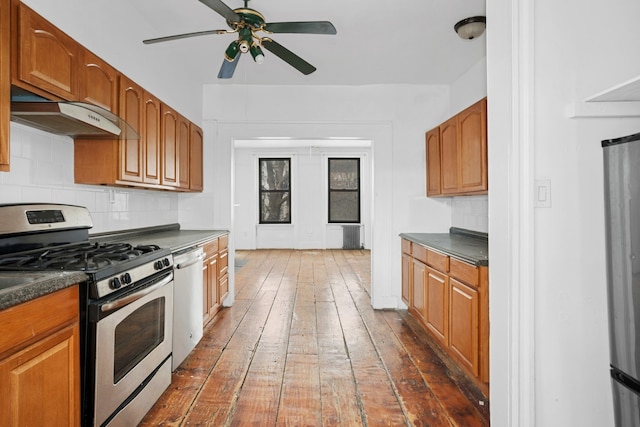 424 Atlantic Avenue Multifam, New York City, NY 11217 - kitchen with appliances with stainless steel finishes, under cabinet range hood, dark countertops, and a ceiling fan