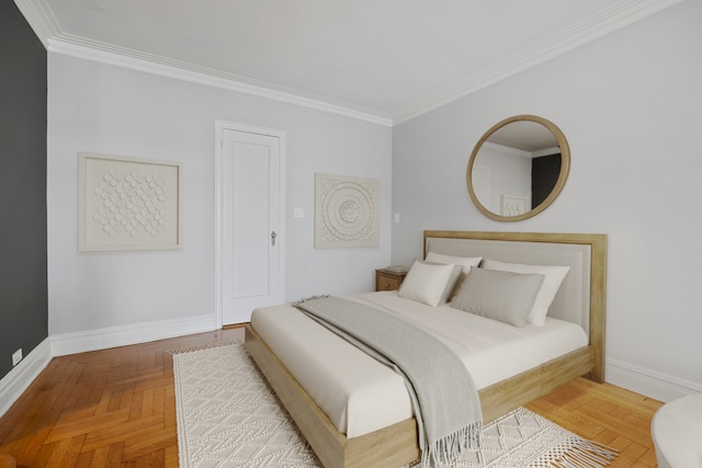bedroom with ornamental molding and baseboards
