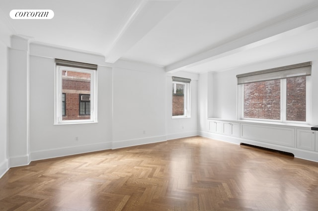 530 Park Ave Unit 5H, New York City, NY 10065 - unfurnished room with beam ceiling and wainscoting