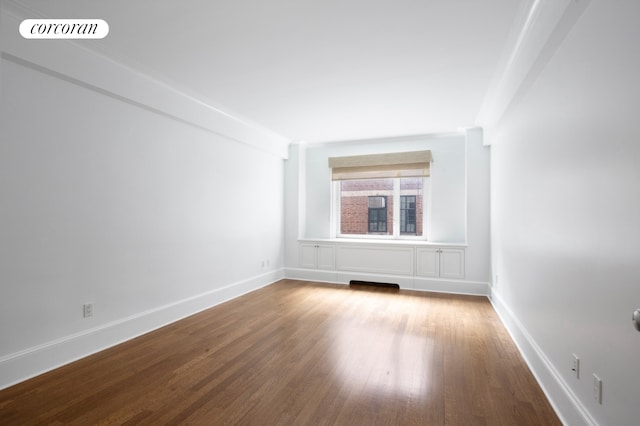 530 Park Ave Unit 5H, New York City, NY 10065 - unfurnished room with wood finished floors and baseboards