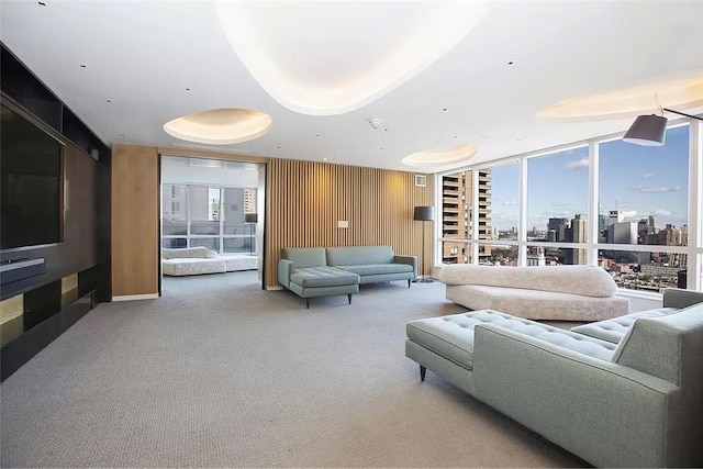 common area featuring a wall of windows and wooden walls