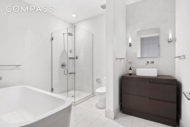 360 Furman St Unit 320/321, New York City, NY 11201 - full bath featuring a shower stall, toilet, baseboards, vanity, and recessed lighting