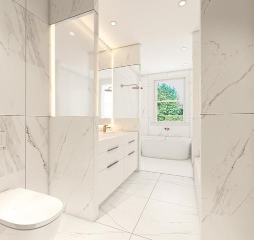 57 W 130th St Pha, Pha, New York City, NY 10037 - full bath featuring marble look tile flooring, tile walls, a soaking tub, vanity, and a shower