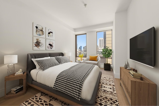 bedroom featuring wood finished floors
