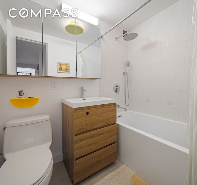 bathroom with toilet, shower / bathtub combination with curtain, and vanity