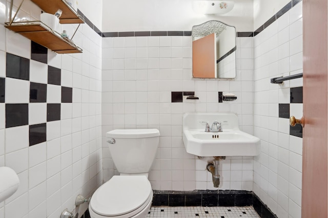 1010 Sherman Ave Unit 5L, New York City, NY 10456 - bathroom with tile walls, toilet, and a sink