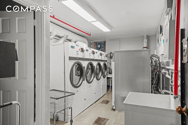 common laundry area featuring washer and dryer