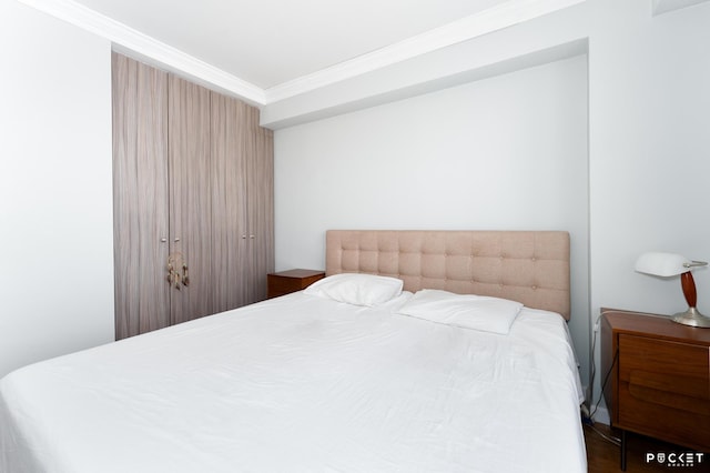 bedroom featuring ornamental molding