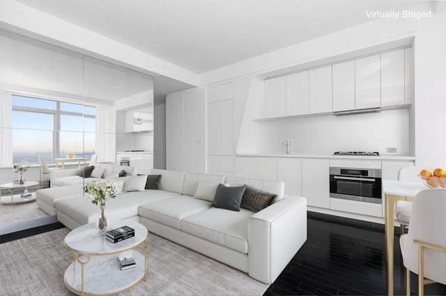 123 Washington St Unit 50H, New York City, NY 10006 - living area with wood finished floors