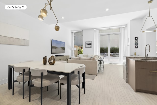 91 Leonard St Unit 2E, New York City, NY 10013 - dining area with recessed lighting and light wood-style flooring