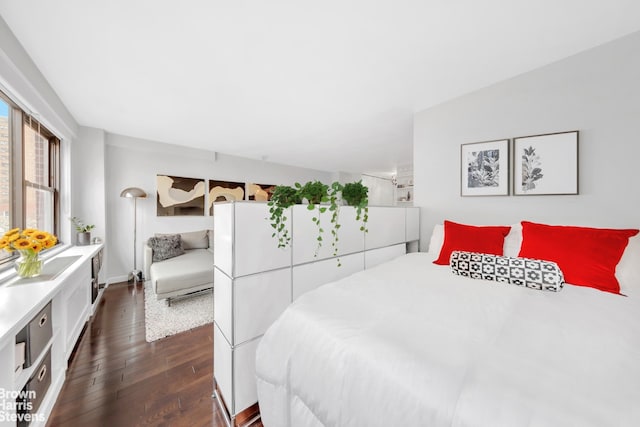 200 E 27th St Unit 6J, New York City, NY 10016 - bedroom featuring dark wood-type flooring