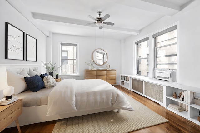 425 E 51st St Unit 5G, New York City, NY 10022 - bedroom with cooling unit, wood finished floors, beamed ceiling, and a ceiling fan