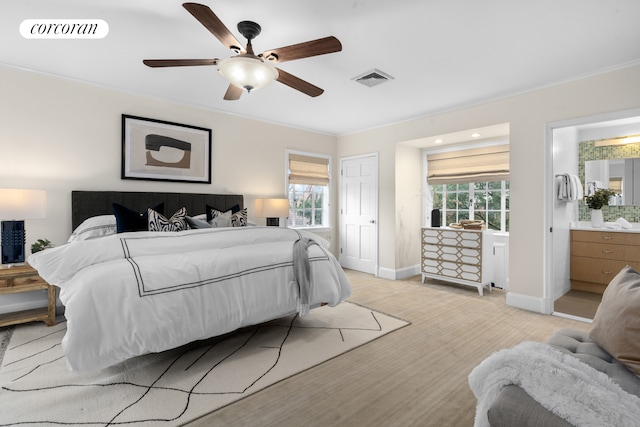 bedroom with a ceiling fan, baseboards, visible vents, and ornamental molding