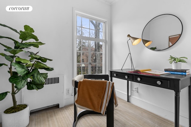 home office with radiator heating unit
