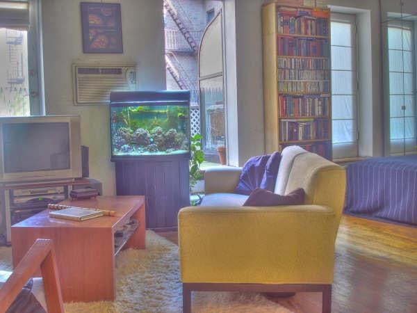 207 W 21st St Unit 3R, New York City, NY 10011 - sitting room with wood finished floors