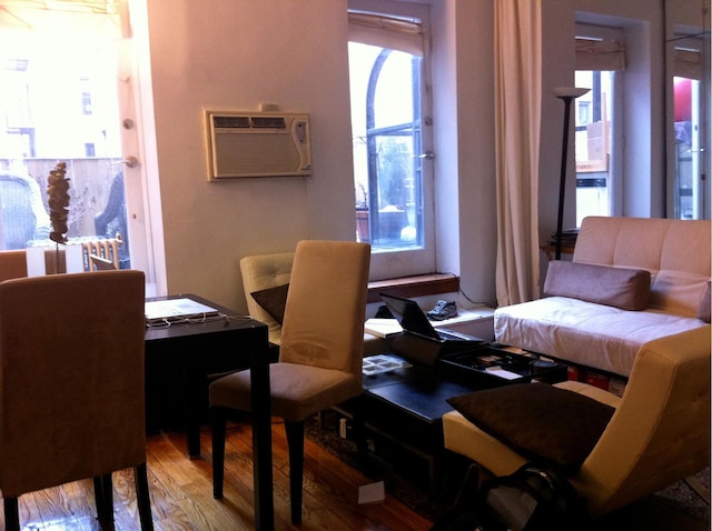 207 W 21st St Unit 3R, New York City, NY 10011 - interior space with wood finished floors and a wall mounted AC