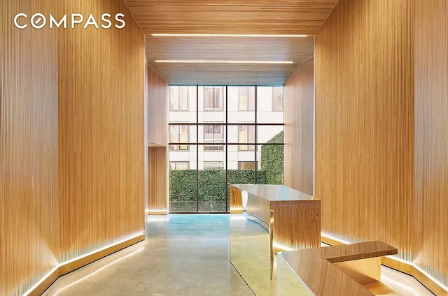 98 Front St Ph, Ph, New York City, NY 11201 - entryway featuring wooden ceiling, finished concrete floors, and a wealth of natural light