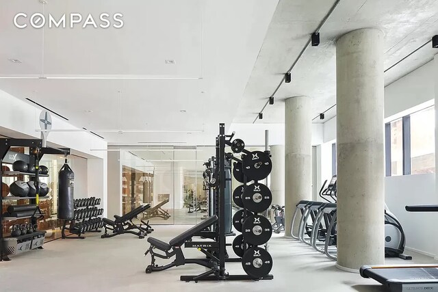 98 Front St Ph, Ph, New York City, NY 11201 - gym featuring rail lighting and decorative columns