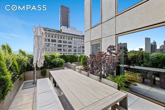 98 Front St Ph, Ph, New York City, NY 11201 - view of community featuring a view of city, a patio, and outdoor dining area