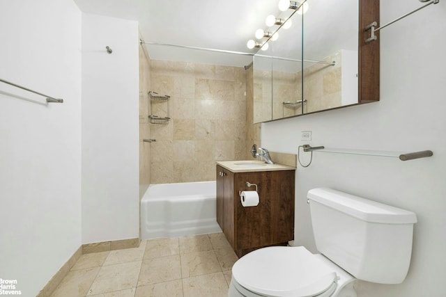 bathroom with toilet, vanity, tub / shower combination, and baseboards