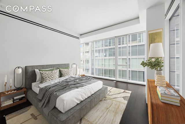 bedroom featuring wood finished floors