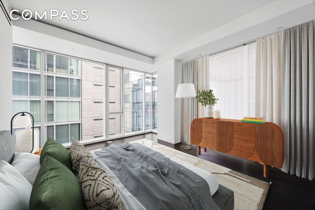 bedroom featuring wood finished floors